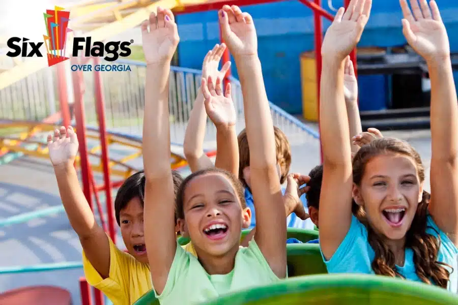 Lonati Law Firm Summer giveaway Six Flags Over Georgia- Children on a roller coaster