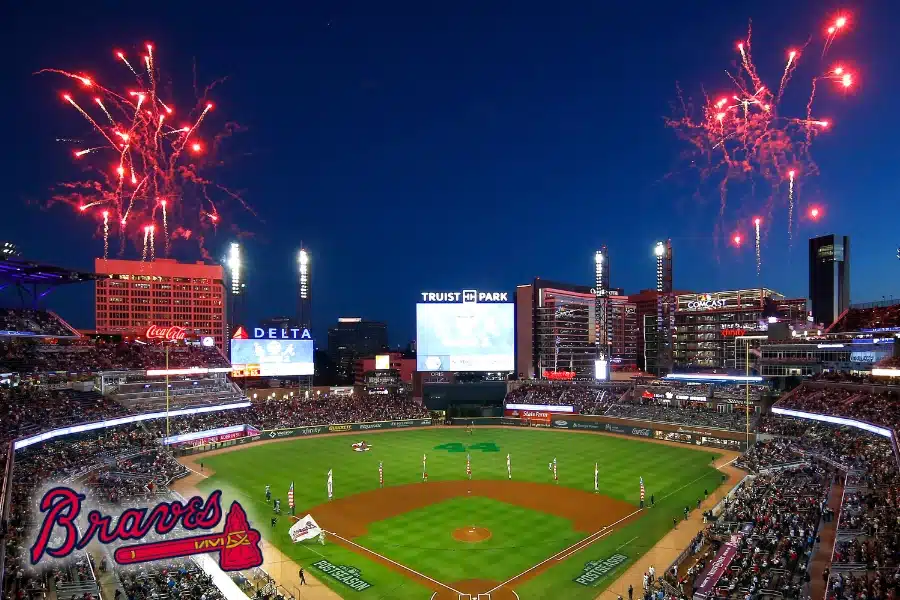 Lonati law Firm Summer Giveaway Braves Game Tickets - Truist stadium at night filled with patrons with red fireworks in the sky